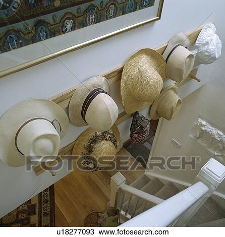 Aerial view of straw hat collection above traditional white staircase View Large Photo Image Stock Image - Aerial view of straw hat collection above traditional white staircase. Fotosearch