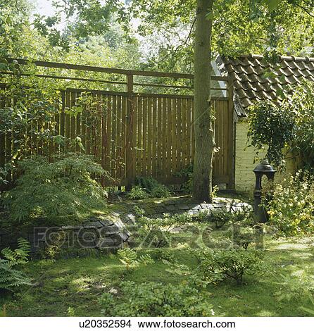 Bamboo fence in country garden View Large Photo Image Picture - Bamboo fence in country garden. Fotosearch