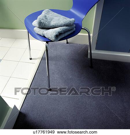 Bathroom Detail of Towel on Blue Chair View Large Photo Image Stock Photo - Bathroom Detail of Towel on Blue Chair. Fotosearch