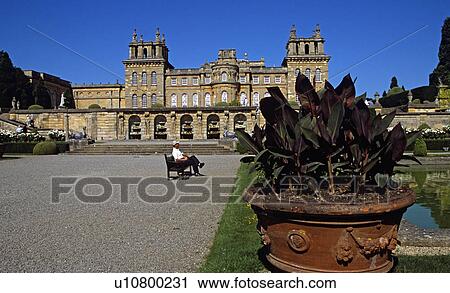 Stock Image - Blenheim Palace, Woodstock, near Oxford, Oxfordshire, England. Water fountains in wall, large plant pot, lower water terrace. Fotosearch