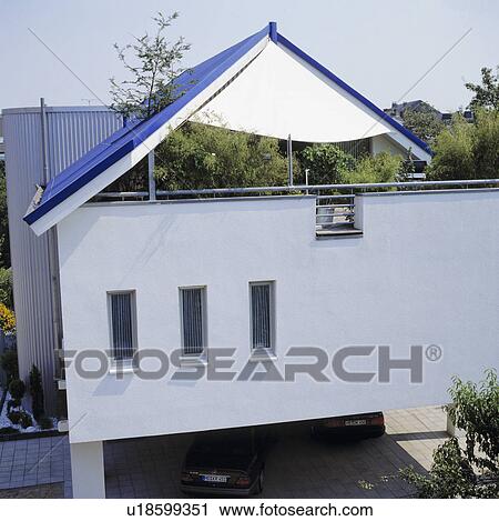 Blue roof above roof terrace on modern white house in the country View Large Photo Image Stock Image - Blue roof above roof terrace on modern white house in the country. Fotosearch