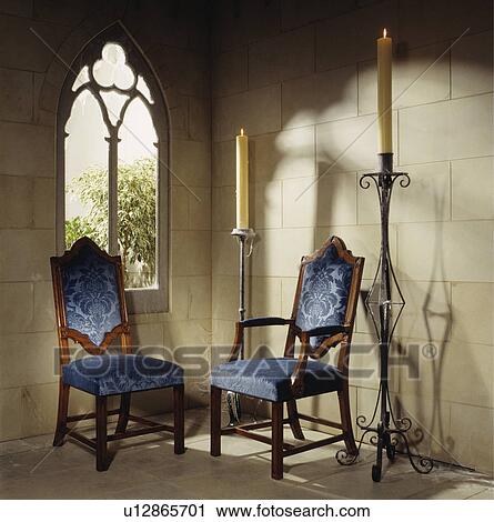 Blue upholstered Gothic chairs in front of Gothic window View Large Photo Image Stock Image - Blue upholstered Gothic chairs in front of Gothic window. Fotosearch