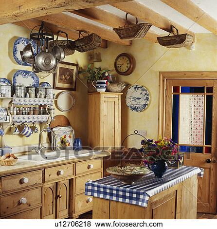 Blue White Checked Cloth On Island Unit In Cottage Kitchen With