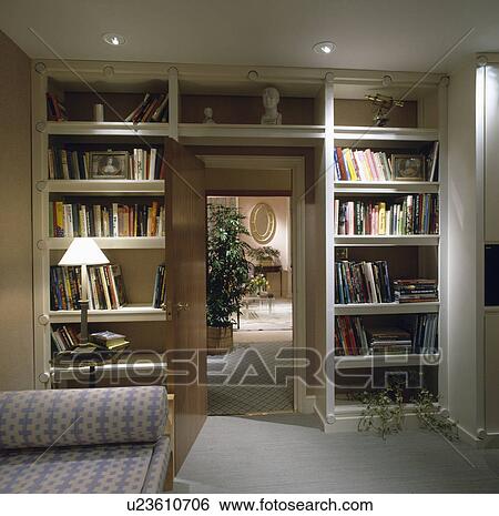 Bookshelves in traditional living room View Large Photo Image Stock Photograph - Bookshelves in traditional living room. Fotosearch