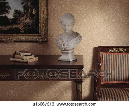 Classical marble bust on console table in hall with patterned neutral wallpaper View Large Photo Image Stock Image - Classical marble bust on console table in hall with patterned neutral wallpaper. Fotosearch