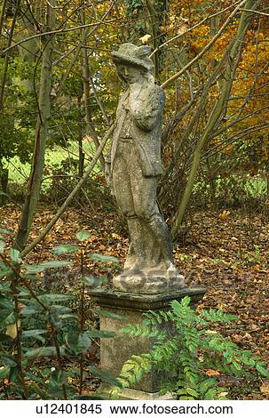 Classical statue in woodland country garden in Autumn View Large Photo Image Stock Photography - Classical statue in woodland country garden in Autumn. Fotosearch
