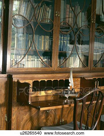 Stock Image - Close-up of antique Georgian bureau-bookcase. Fotosearch
