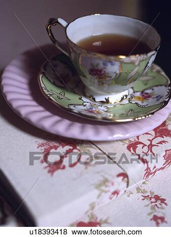 Close-up of antique green floral teacup View Large Photo Image Stock Photo - Close-up of antique green floral teacup. Fotosearch