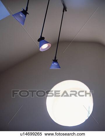 Close-up of blue metal ceiling lights View Large Photo Image Stock Photography - Close-up of blue metal ceiling lights. Fotosearch