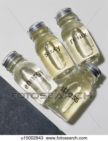 Close-up of bottles of aromatherapy bath oils View Large Photo Image Stock Image - Close-up of bottles of aromatherapy bath oils. Fotosearch