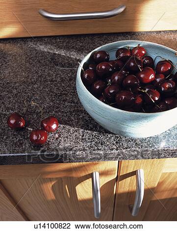 Close-up of bowl of cherries on granite worktop View Large Photo Image Stock Image - Close-up of bowl of cherries on granite worktop. Fotosearch