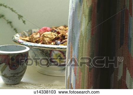 Close up of ceramic pot beside dish with potpourri View Large Photo Image Stock Image - Close up of ceramic pot beside dish with potpourri. Fotosearch