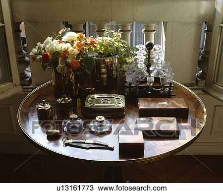 Close-up of collection of antique boxes and inkwells on antique table View Large Photo Image Stock Image - Close-up of collection of antique boxes and inkwells on antique table. Fotosearch