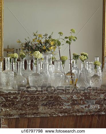 Close-up of collection of antique glass decanters View Large Photo Image Stock Photo - Close-up of collection of antique glass decanters. Fotosearch
