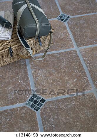 Stock Photo - Close-up of floor tiles with mosaic insets. Fotosearch
