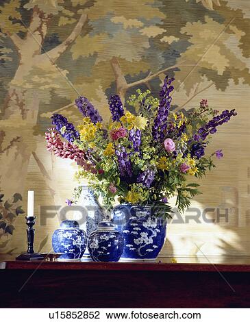Close-up of floral arrangement with blue+white vases View Large Photo Image Stock Image - Close-up of floral arrangement with blue+white vases. Fotosearch