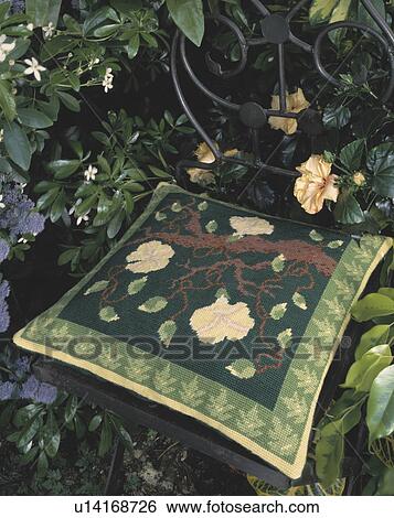 Close-up of floral cross-stitch cushion View Large Photo Image Stock Photograph - Close-up of floral cross-stitch cushion. Fotosearch