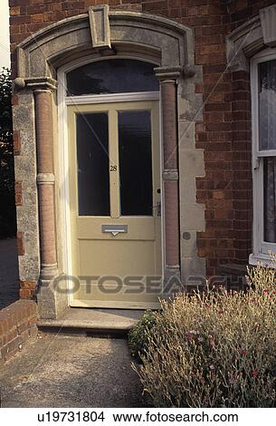 Close-up of half-glazed traditional cream front door View Large Photo Image Picture - Close-up of half-glazed traditional cream front door. Fotosearch