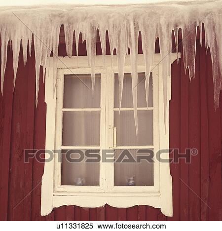 Close-up of icicles on roof above window View Large Photo Image Stock Photography - Close-up of icicles on roof above window. Fotosearch