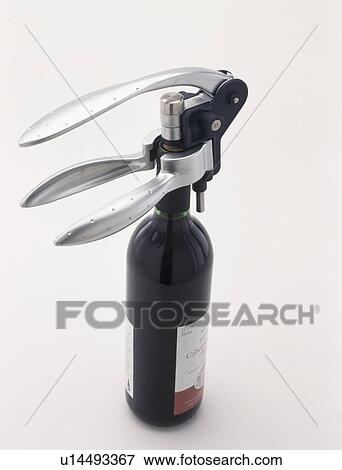 Close-up of Le Creuset screwpull corkscrew with wine bottle View Large Photo Image Stock Photo - Close-up of Le Creuset screwpull corkscrew with wine bottle. Fotosearch
