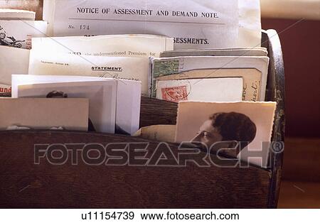 Close-up of letters in wooden letter rack View Large Photo Image Stock Photo - Close-up of letters in wooden letter rack. Fotosearch