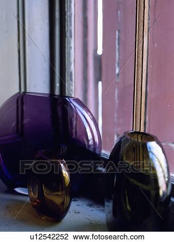Close-up of modern purple glass vases View Large Photo Image Stock Image - Close-up of modern purple glass vases. Fotosearch