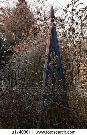 Stock Image - Close-up of modern sculpture in the garden. Fotosearch