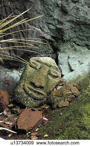 Stock Photo - Close-up of modern sculpture in the garden. Fotosearch