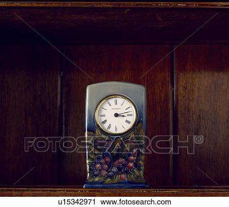 Close-up of Moorcroft pottery clock View Large Photo Image Stock Image - Close-up of Moorcroft pottery clock. Fotosearch