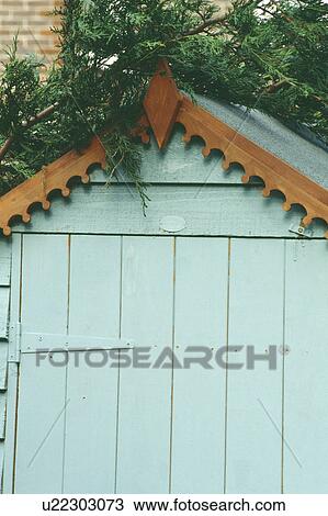 Close-up of painted pastel blue garden shed with plain wood eaves View Large Photo Image Stock Image - Close-up of painted pastel blue garden shed with plain wood eaves. Fotosearch