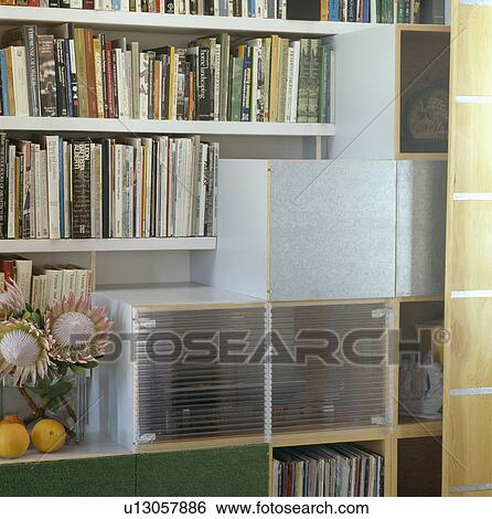 Close up of perspex storage boxes on bookshelves View Large Photo Image Stock Photograph - Close up of perspex storage boxes on bookshelves. Fotosearch