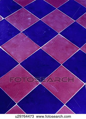 Close-up of red+blue chequerboard tiled floor View Large Photo Image Stock Image - Close-up of red+blue chequerboard tiled floor. Fotosearch