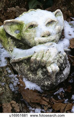 Close-up of sculpture in country garden in winter View Large Photo Image Stock Image - Close-up of sculpture in country garden in winter. Fotosearch