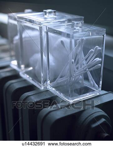 Close-up of square glass storage jars View Large Photo Image Stock Image - Close-up of square glass storage jars. Fotosearch