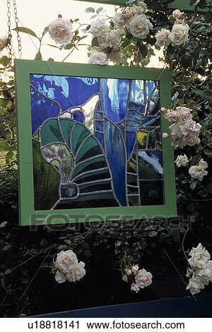 Close-up of stained glass picture in the garden View Large Photo Image Stock Image - Close-up of stained glass picture in the garden. Fotosearch