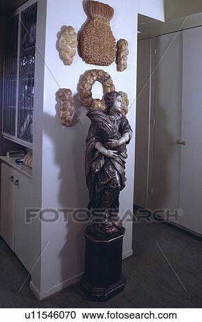 Close-up of statue below plaster cornsheaves View Large Photo Image Stock Image - Close-up of statue below plaster cornsheaves. Fotosearch