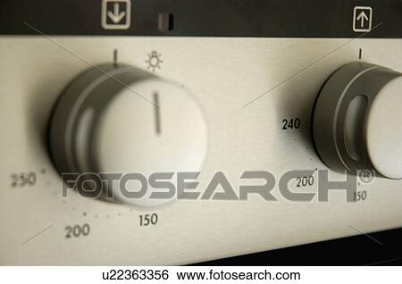 Close-up of temperature dials on electric oven View Large Photo Image Stock Photograph - Close-up of temperature dials on electric oven. Fotosearch