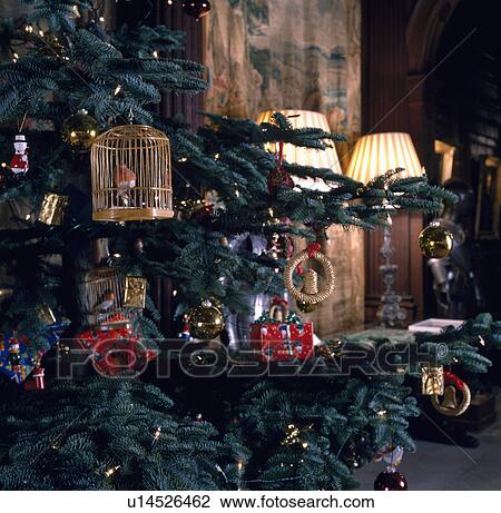Close-up of traditional decorations on Christmas tree View Large Photo Image Stock Image - Close-up of traditional decorations on Christmas tree. Fotosearch