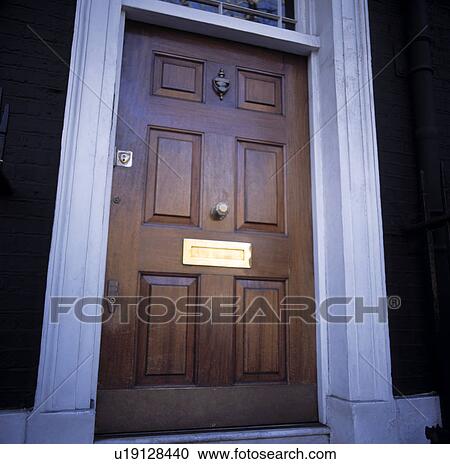 Close-up of traditional wooden front door View Large Photo Image Stock Image - Close-up of traditional wooden front door . Fotosearch