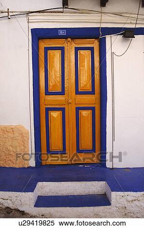 Close-up of traditional wooden front door with blue detail View Large Photo Image Stock Photography - Close-up of traditional wooden front door with blue detail. Fotosearch