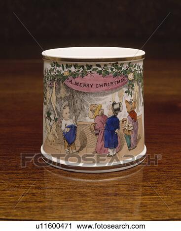 Stock Image - Close up of Victorian pictorial Christmas cup. Fotosearch