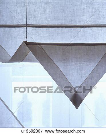 Close-up of white linen blind with pointed edge View Large Photo Image Stock Photo - Close-up of white linen blind with pointed edge. Fotosearch