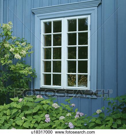 Close-up of window in traditional blue wooden house in the country View Large Photo Image Stock Image - Close-up of window in traditional blue wooden house in the country. Fotosearch