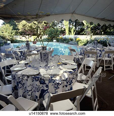 Cloth on table on veranda in country garden in summer View Large Photo Image Stock Photo - Cloth on table on veranda in country garden in summer. Fotosearch