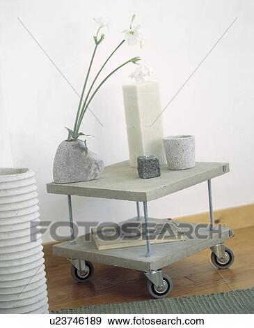 Concrete vase and pots on concrete trolley View Large Photo Image Stock Photo - Concrete vase and pots on concrete trolley. Fotosearch