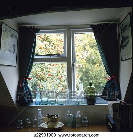 Stock Image - cottage, interior, halls, interiors, windows, bottles. Fotosearch
