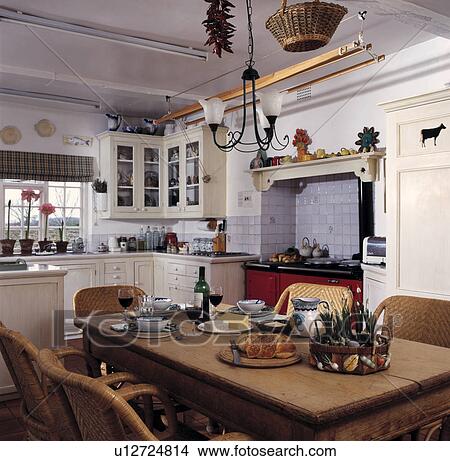 Country Kitchen with Food on the Table. View Large Photo Image Picture - Country Kitchen with Food on the Table.. Fotosearch