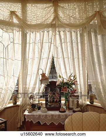 Cream lace curtains on window View Large Photo Image Stock Image - Cream lace curtains on window. Fotosearch