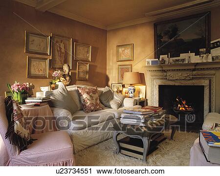 Cream sofa in terracotta living room View Large Photo Image Stock Image - Cream sofa in terracotta living room. Fotosearch