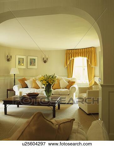 Cream sofas in traditional cream living room View Large Photo Image Stock Photo - Cream sofas in traditional cream living room. Fotosearch